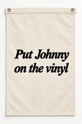 “Put Johnny on the vinyl” canvas flag on a white background