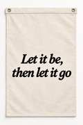 “Let it be, then let it go” canvas flag on a white background